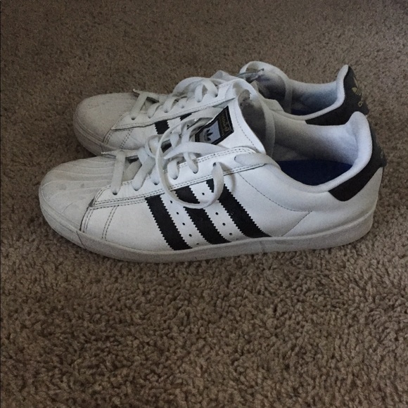 navy blue adidas skate shoes